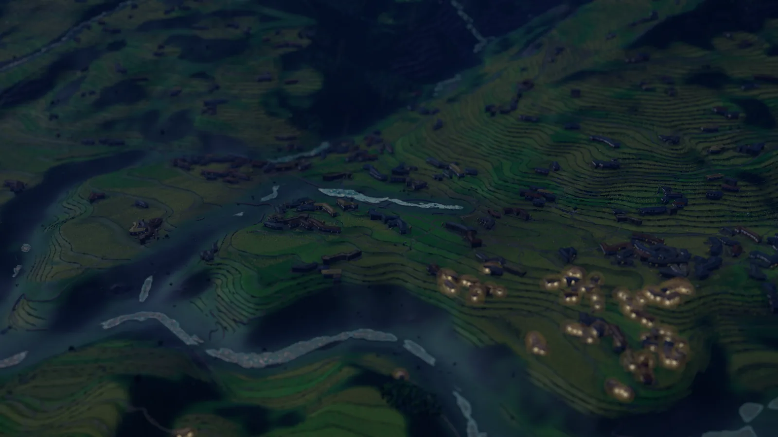 The valley at night, villages as constellations of warm lamplight.